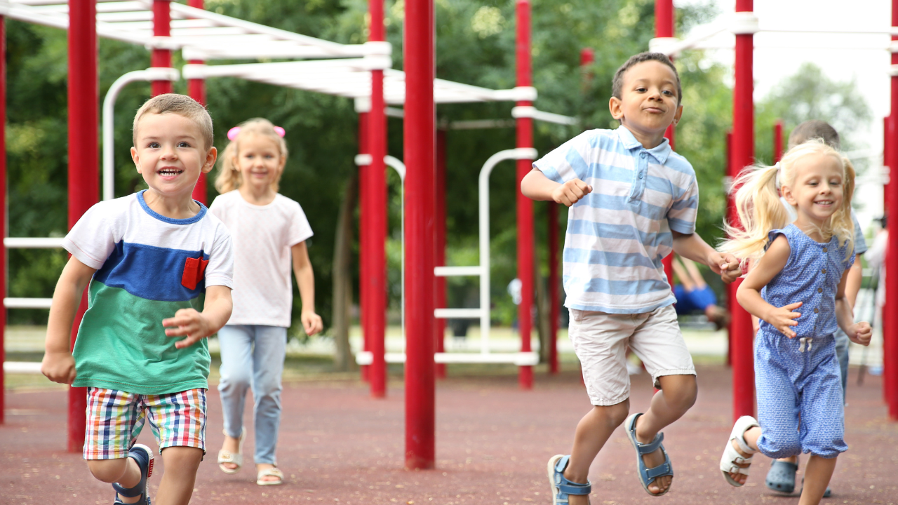 Children playing various games on a playground