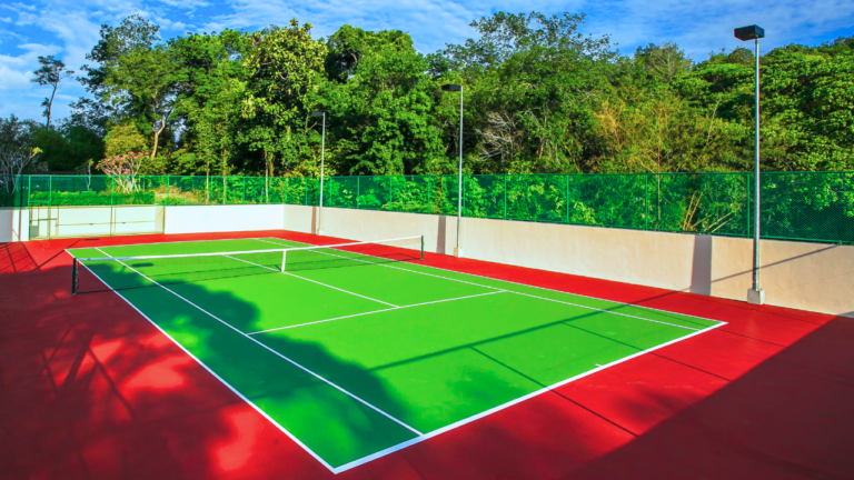 Close-up view of tennis court flooring showcasing different surface materials.