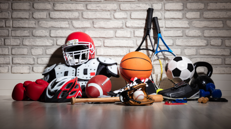 Various sports equipment laid out for selection, representing different types of sports gear.